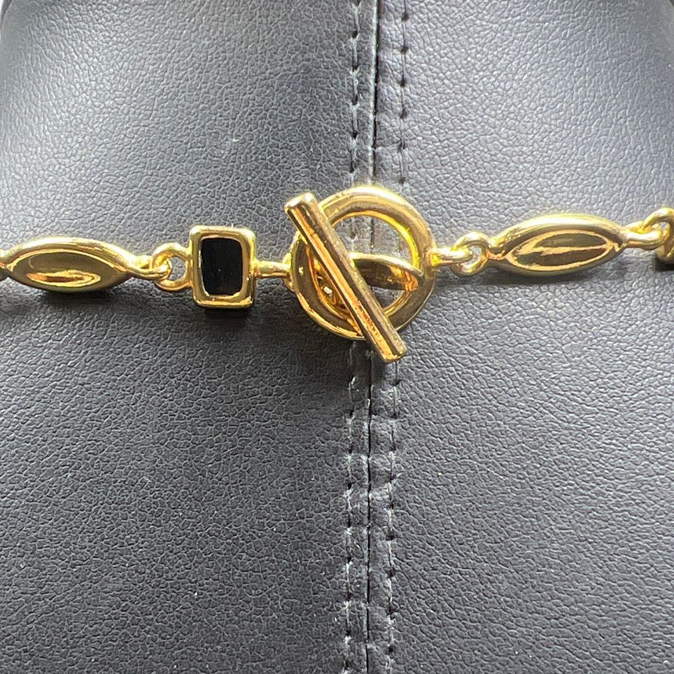 Worthington Gold Tone Black Enamel Necklace and Earrings Set