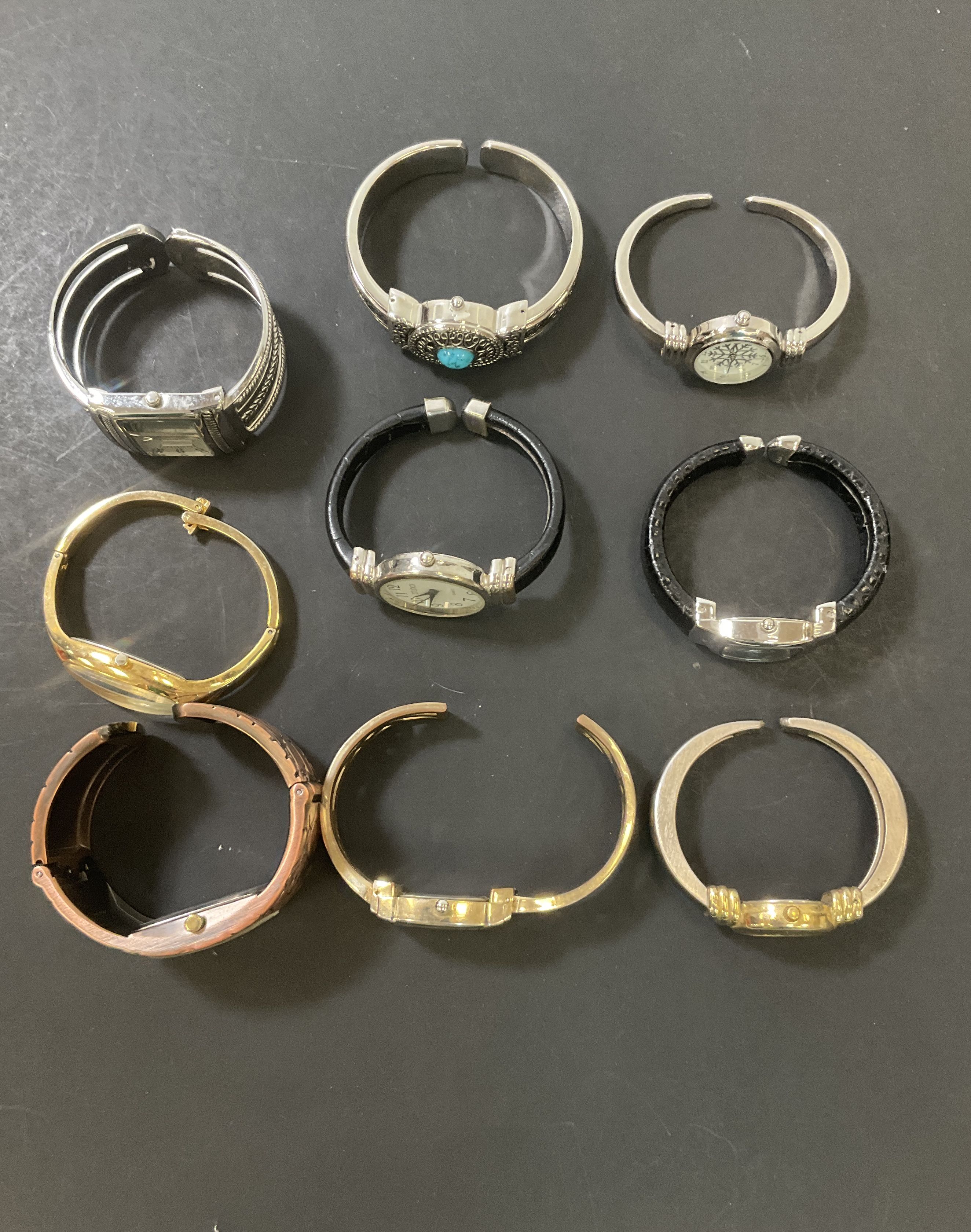 Lot of Nine Women's Cuff Watches Wristwatches Silver Tone Gold Tone UNTESTED