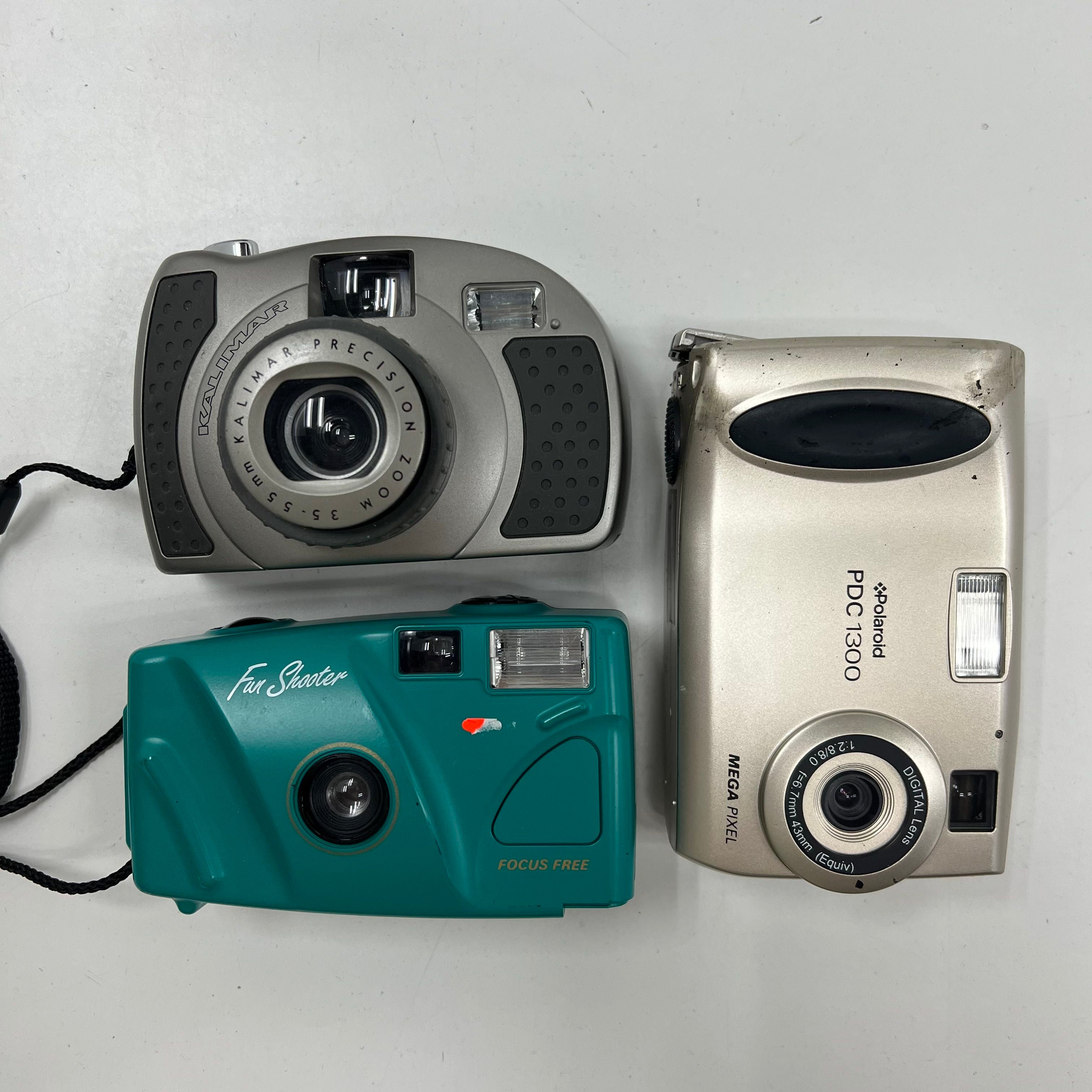 Lot of 4 Petri Polaroid Film Digital Cameras For Parts Repair AS IS