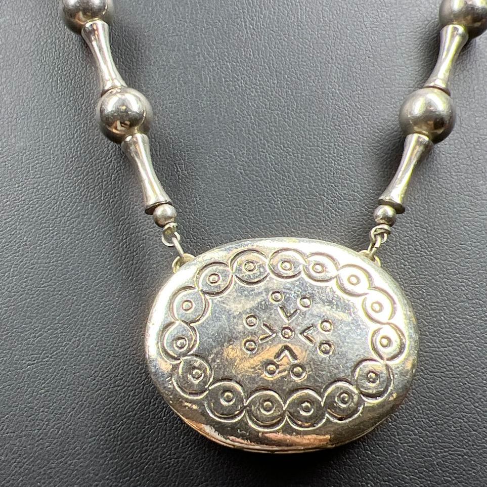 Vintage Etsee Lauder Moonsilver Solid Perfume Locket Necklace with Some Perfume