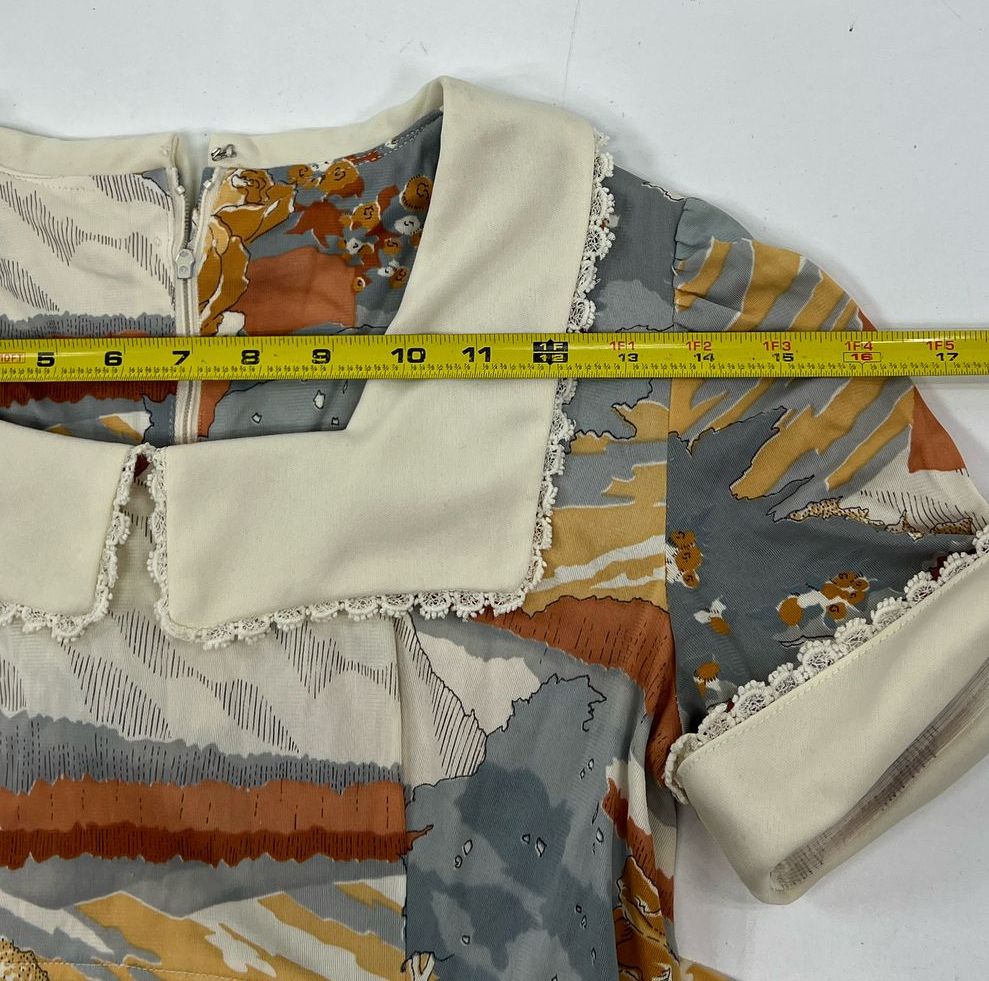 VTG Junior's Handmade Abstract Floral Short Sleeve Tie Waist Dress - Size Small?