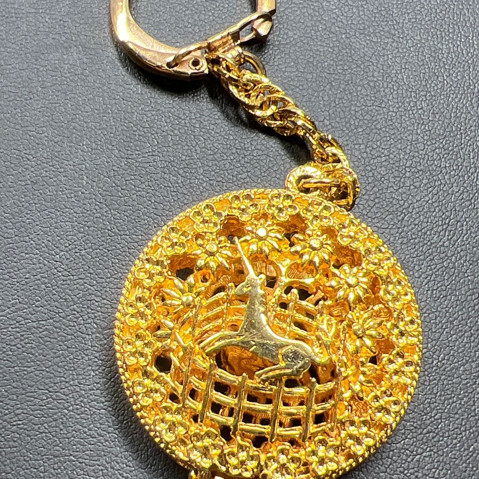 Gold Tone Unicorn Filigree Locket Keychain