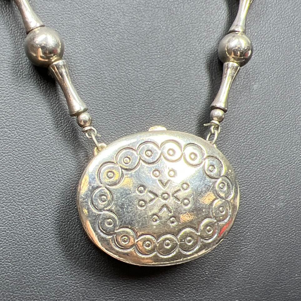 Vintage Etsee Lauder Moonsilver Solid Perfume Locket Necklace with Some Perfume