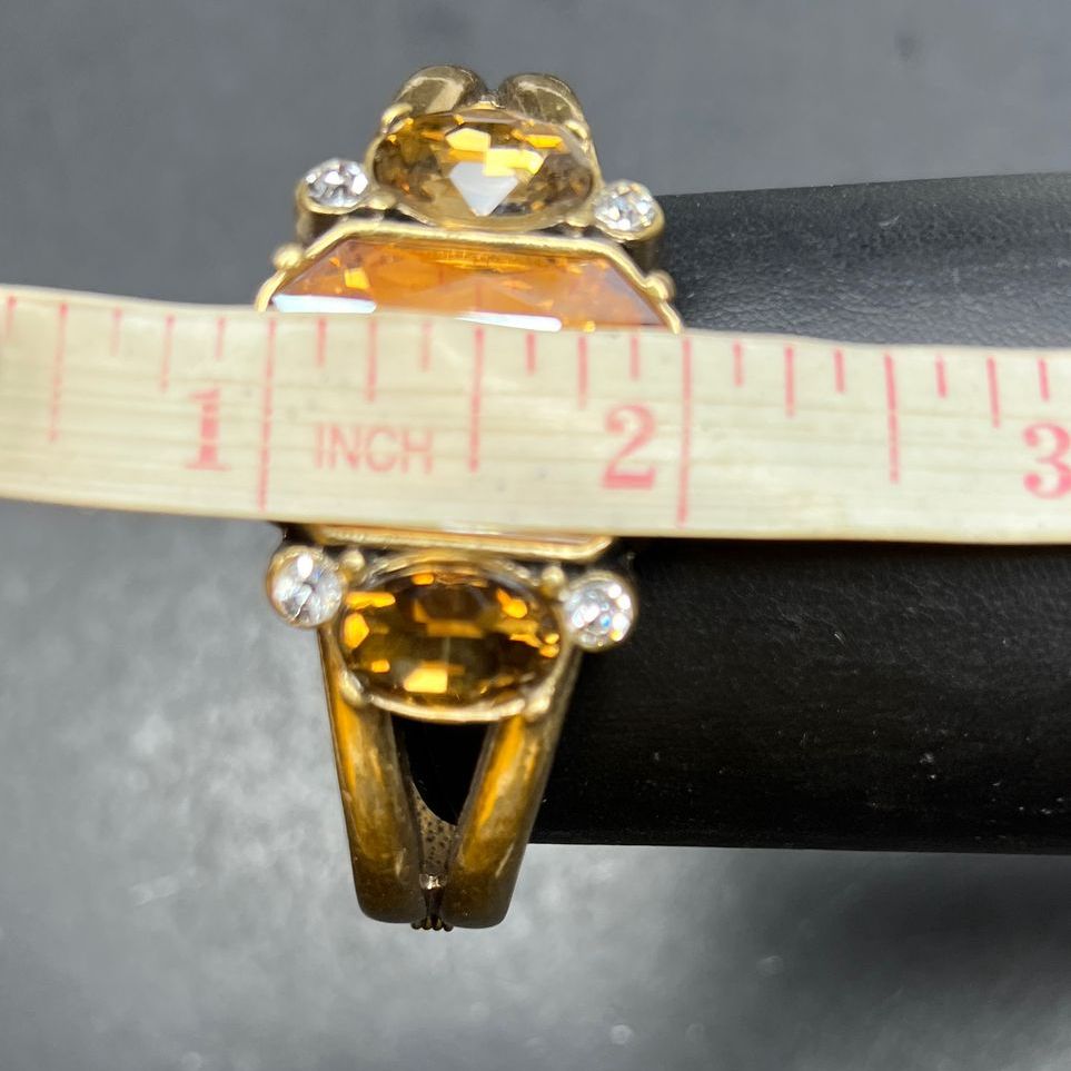 Multifaceted Rhinestone Gold Tone Hinged Bangle Bracelet