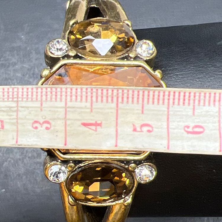Multifaceted Rhinestone Gold Tone Hinged Bangle Bracelet
