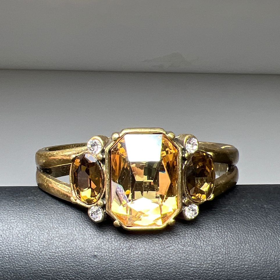 Multifaceted Rhinestone Gold Tone Hinged Bangle Bracelet