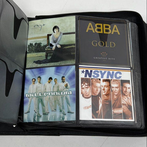 Music CD Lot in Binder Classic Rock Pop Eagles Cher Aerosmith Elvis ABBA