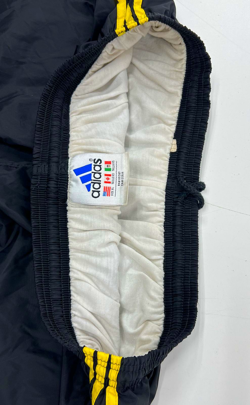 Vintage 1990s Adidas Lined Track Pants Black Yellow Stripe Nylon Zip Ankle