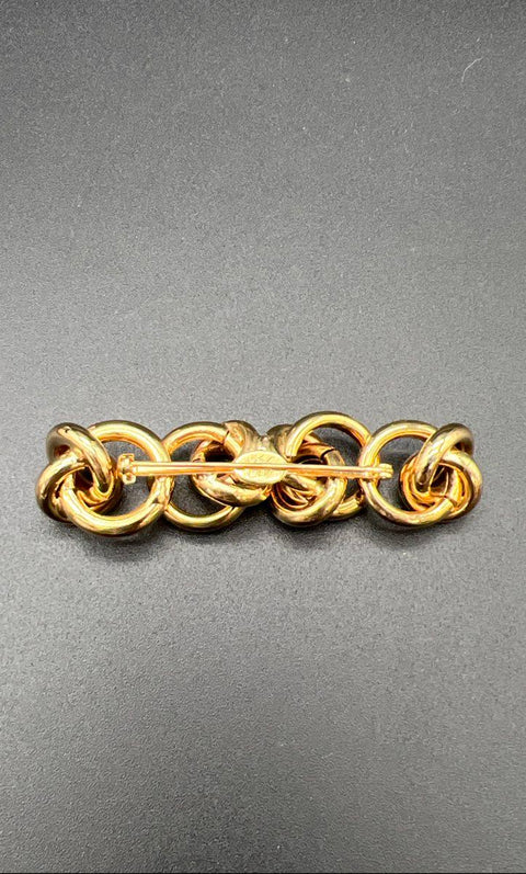 Kirks Folly Gold Plated Interlocking Twist Knot Bar Pin Brooch Vintage