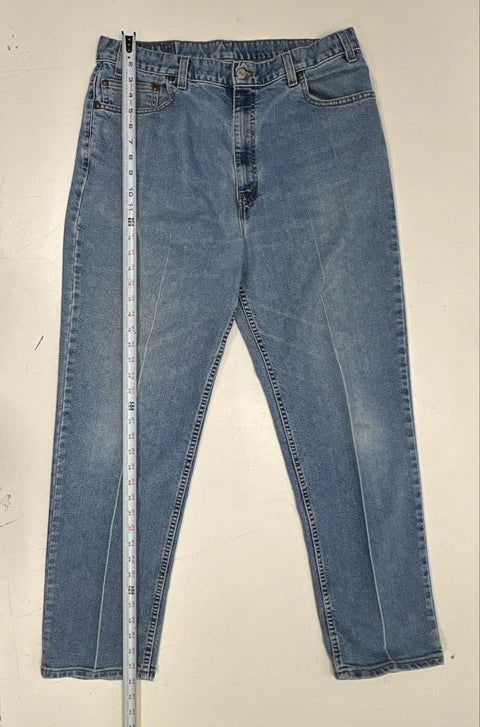 Vintage 90s Levi's Men's Light Wash Relaxed Fit Tapered Jeans Made in USA 38x31
