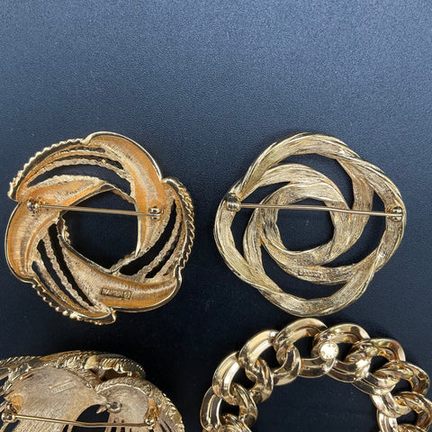 Monet Vintage Gold Tone Brooches Jewelry Lot of 5 Textured Swirl Leaf Chain