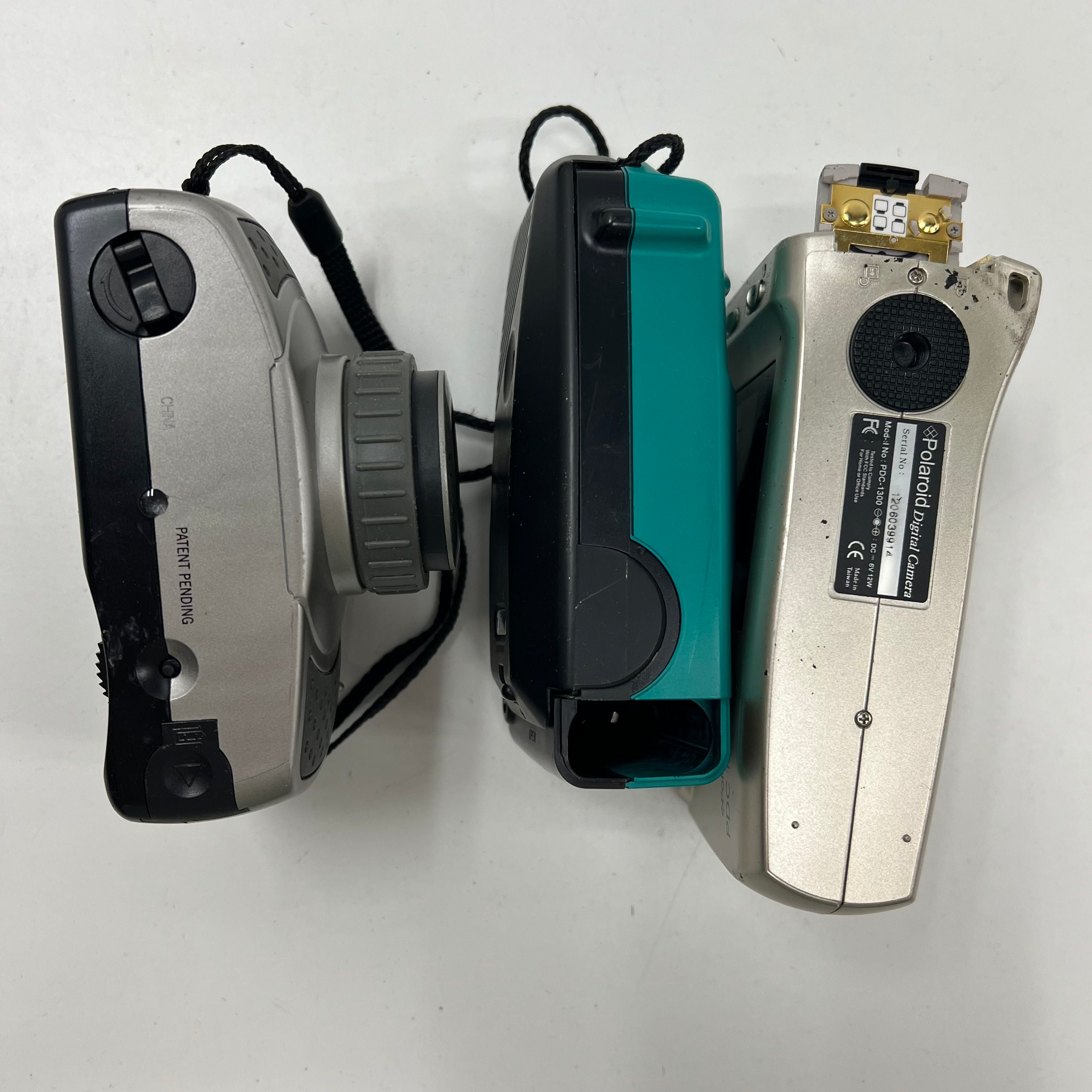 Lot of 4 Petri Polaroid Film Digital Cameras For Parts Repair AS IS
