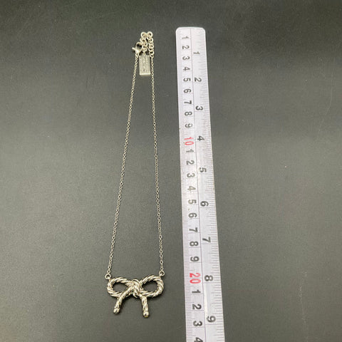 My Flat In London Jan Haedrich Silver Tone Rope Bow Pendant Necklace 18"