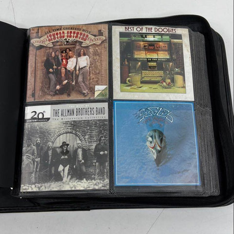 Music CD Lot in Binder Classic Rock Pop Eagles Cher Aerosmith Elvis ABBA