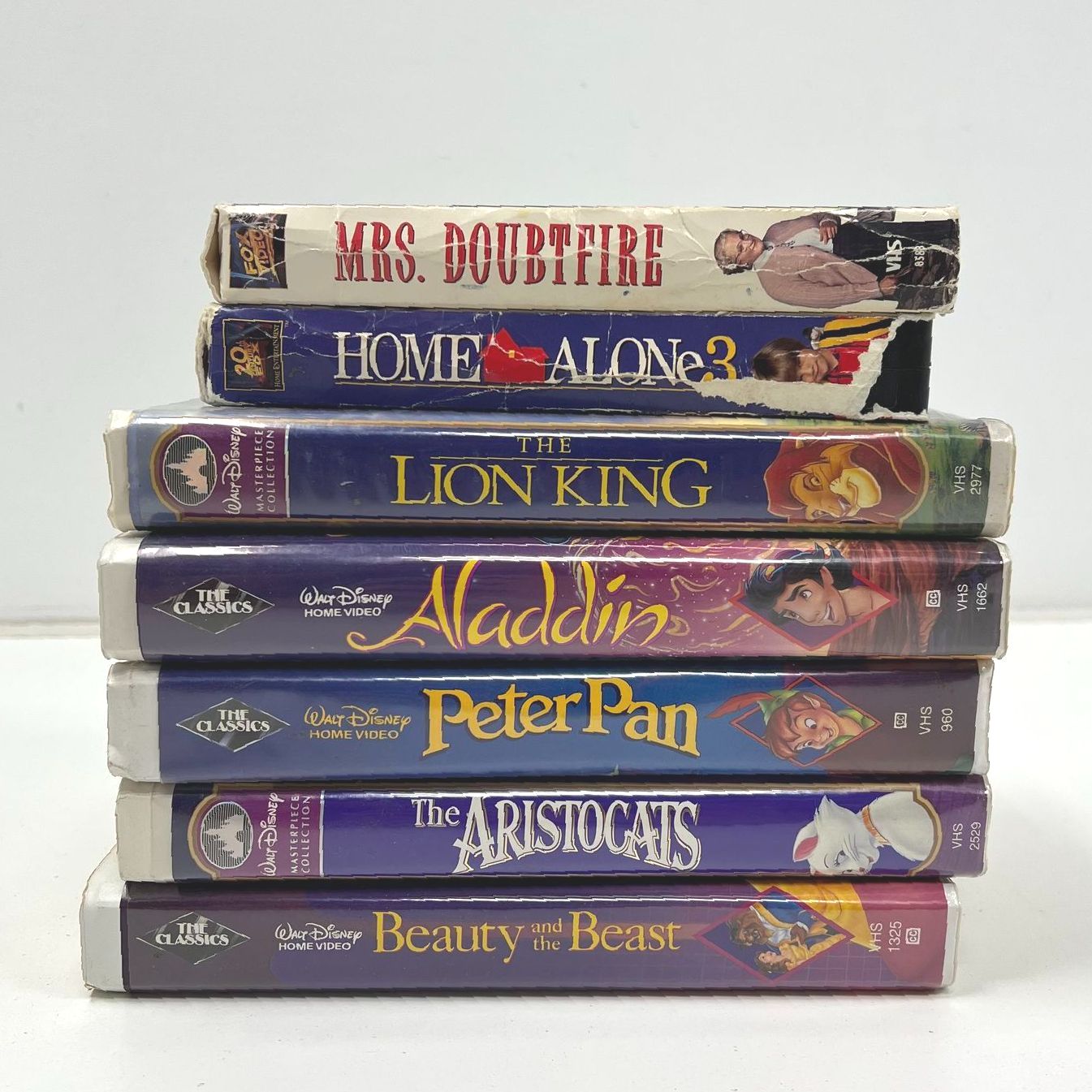 Lot of 7 VHS Tapes Movies Disney Aladdin Lion King Home Alone Doubtfire Others