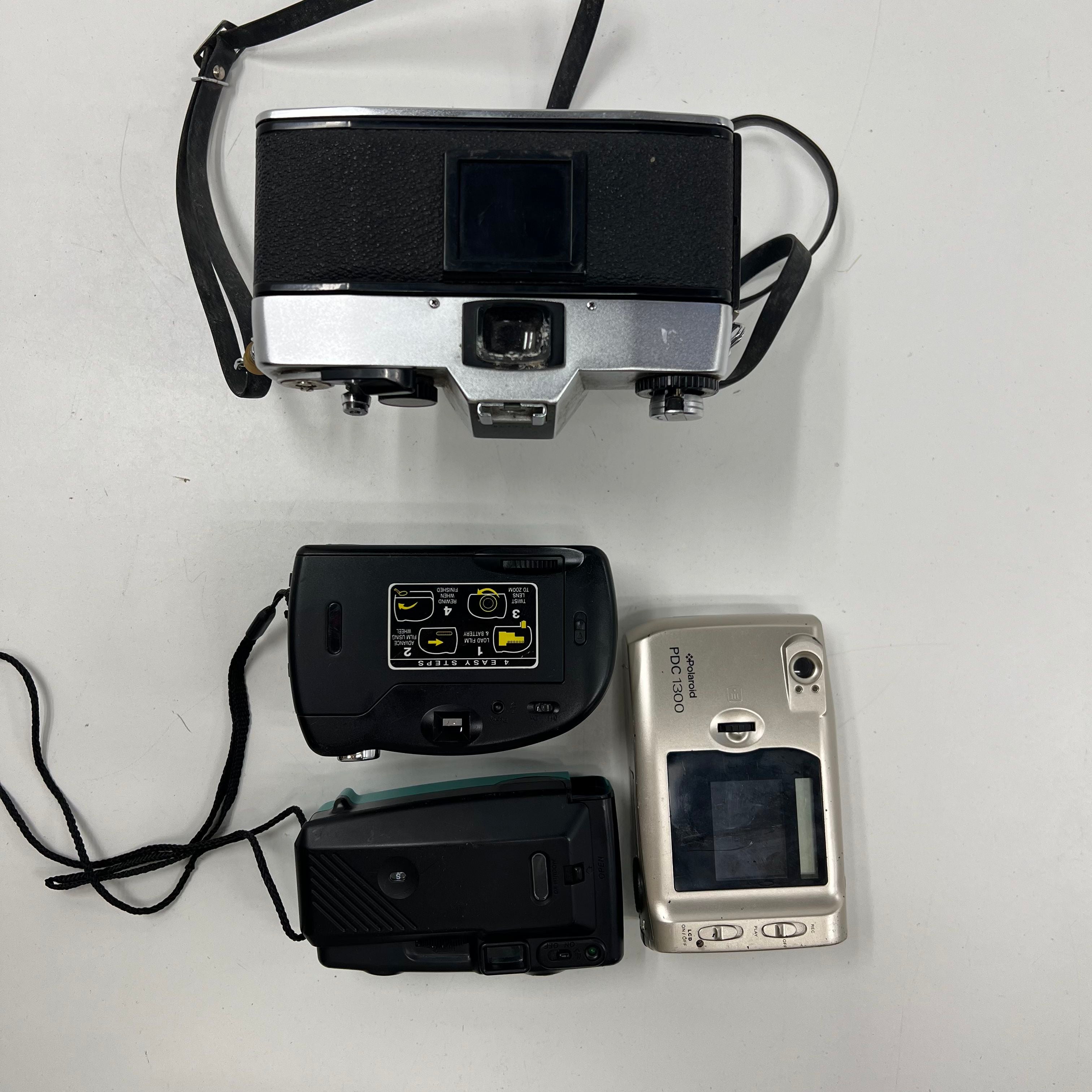 Lot of 4 Petri Polaroid Film Digital Cameras For Parts Repair AS IS