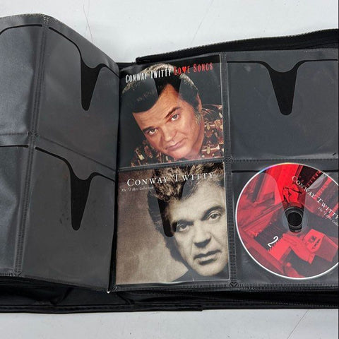 Music CD Lot in Binder Classic Rock Pop Eagles Cher Aerosmith Elvis ABBA