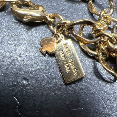Kate Spade Gold Tone Rhinestone Bow Bracelet with Pouch