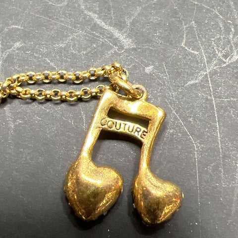 Juicy Couture Gold Tone Rhinestone Music Note Necklace