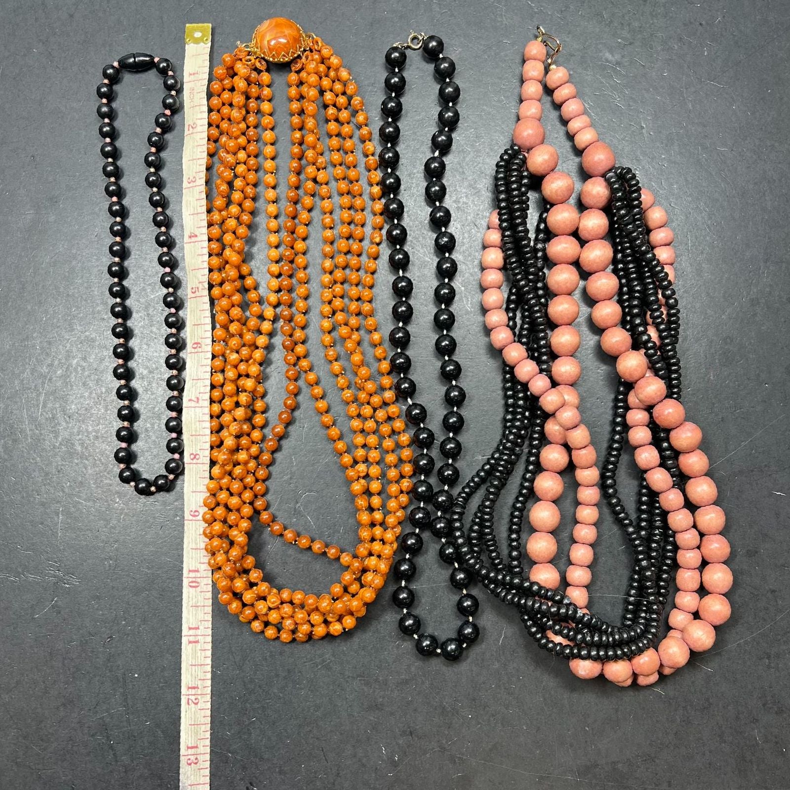 Beaded Multi Strand Orange Black Beaded Necklaces