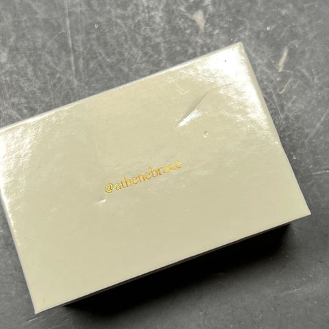 Athene Gold and Silver tone Thumb Braces in Box