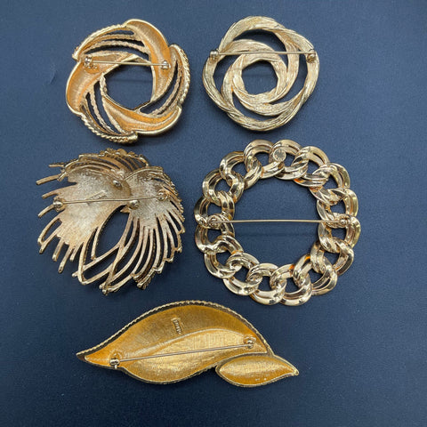 Monet Vintage Gold Tone Brooches Jewelry Lot of 5 Textured Swirl Leaf Chain