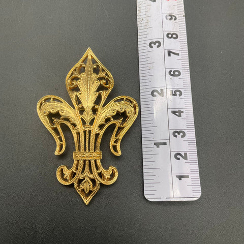 Vintage Monet Gold Tone Fleur De Lis Brooch Textured Openwork Pin