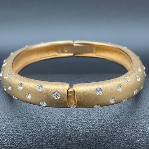 Swarovski Brushed Gold Tone Bangle Bracelet Swan Logo Clear Crystal Accents