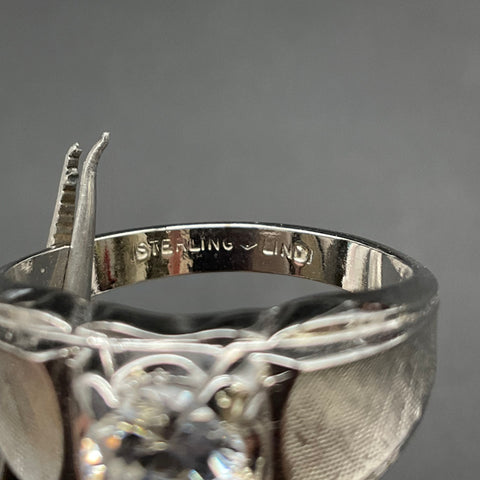 Lind Silver Tone Round Cut Clear Stone Ring Textured Shoulders Size 11