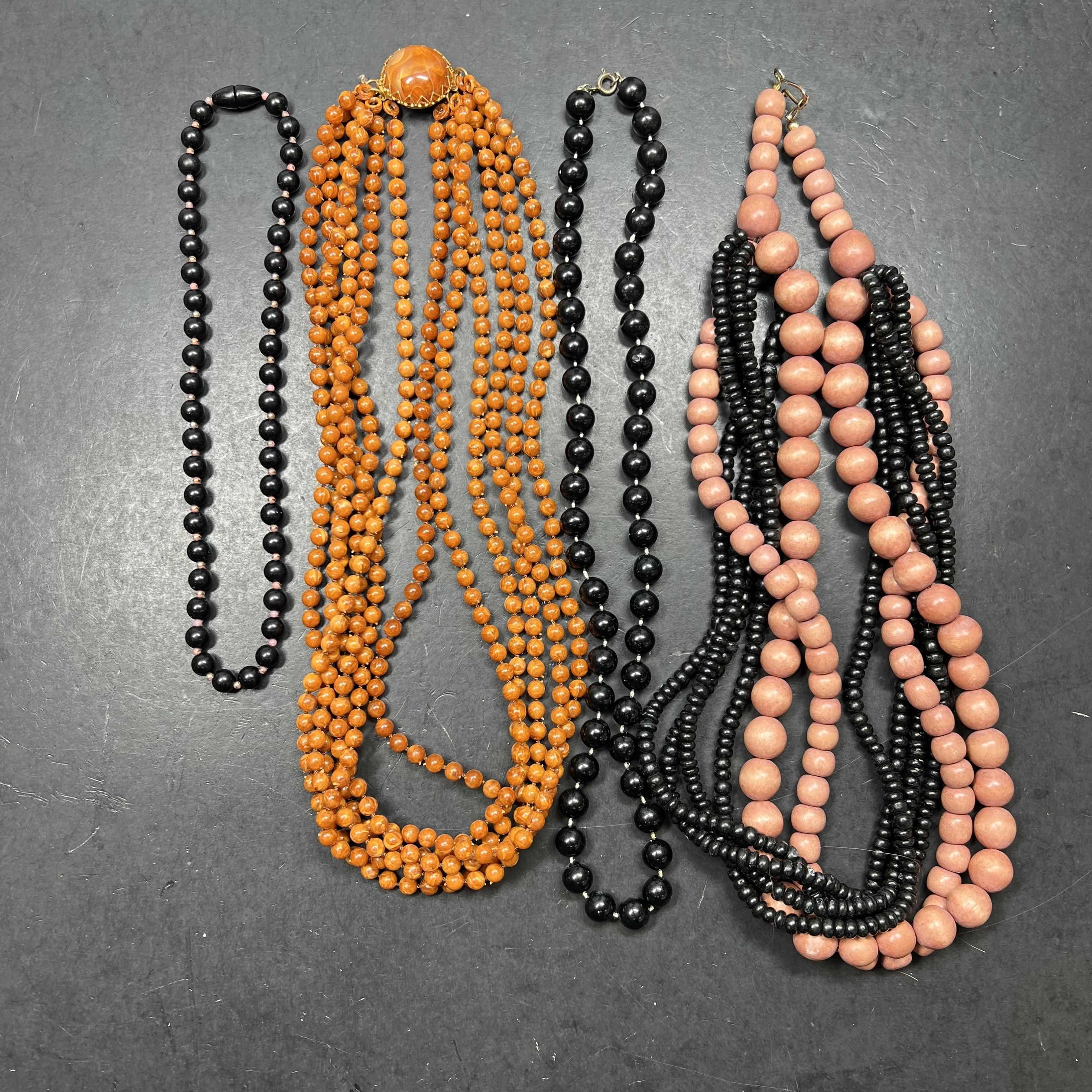 Beaded Multi Strand Orange Black Beaded Necklaces