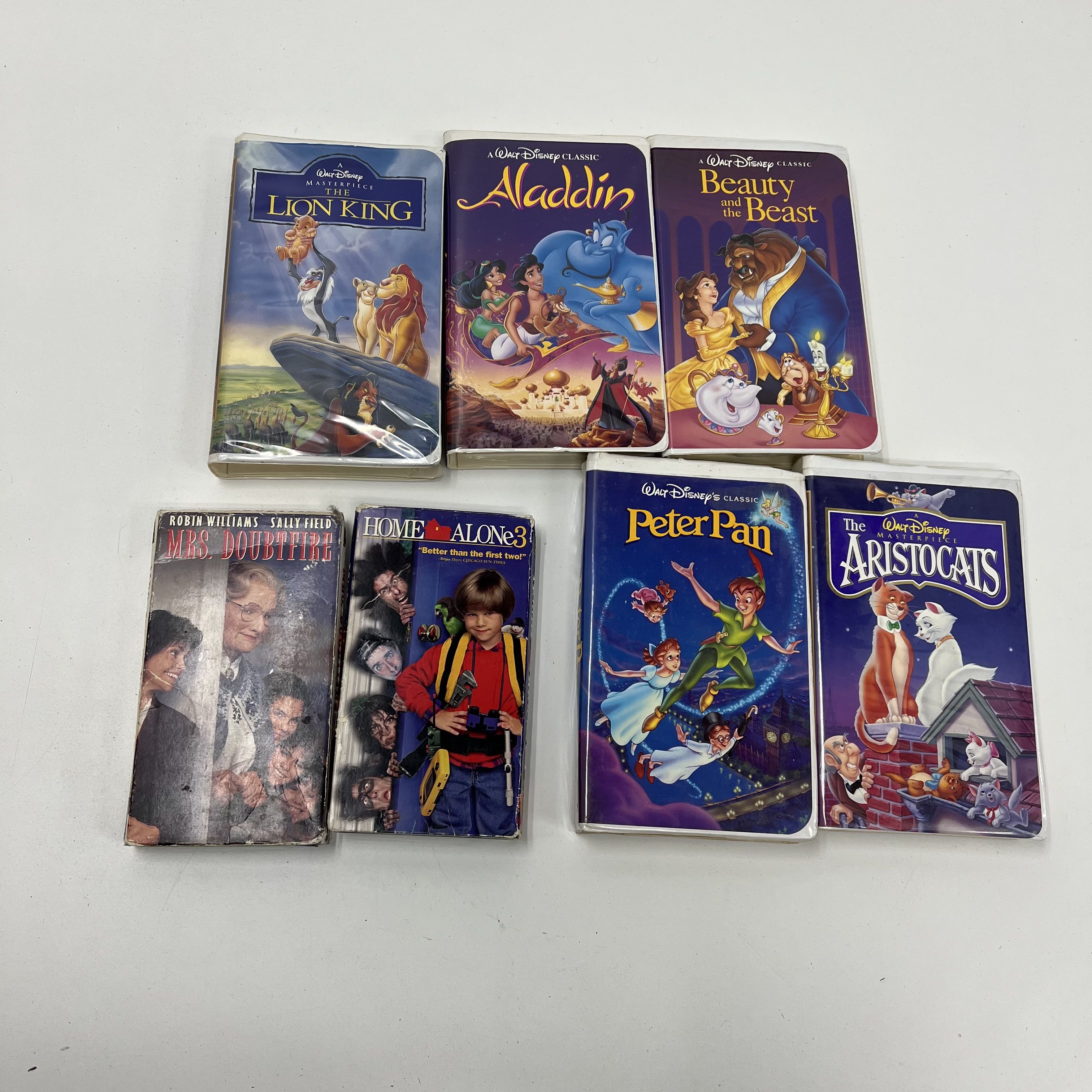 Lot of 7 VHS Tapes Movies Disney Aladdin Lion King Home Alone Doubtfire Others