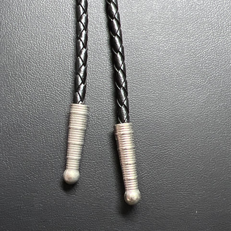 Two Tone Arrowhead Black Leather Cord Bolo Tie