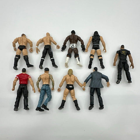 WWE Wrestling Action Figure Lot Undertaker Rock Triple H Stone Cold 9 Figures