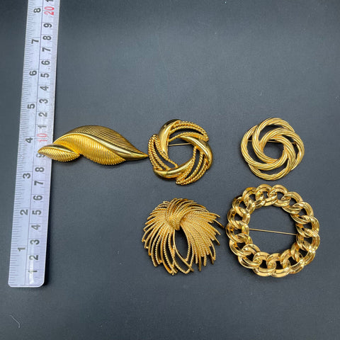 Monet Vintage Gold Tone Brooches Jewelry Lot of 5 Textured Swirl Leaf Chain