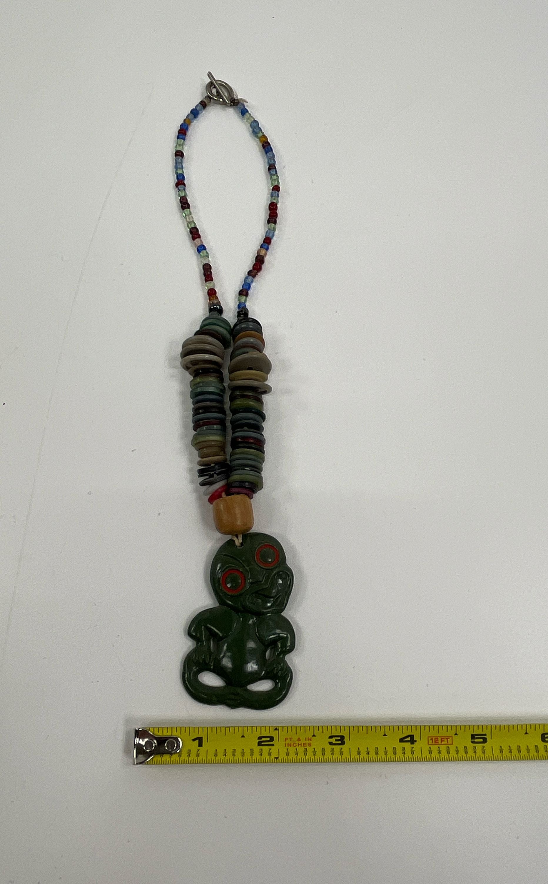 Air New Zealand Plastic Maori Hei Tiki Talisman Button Necklace