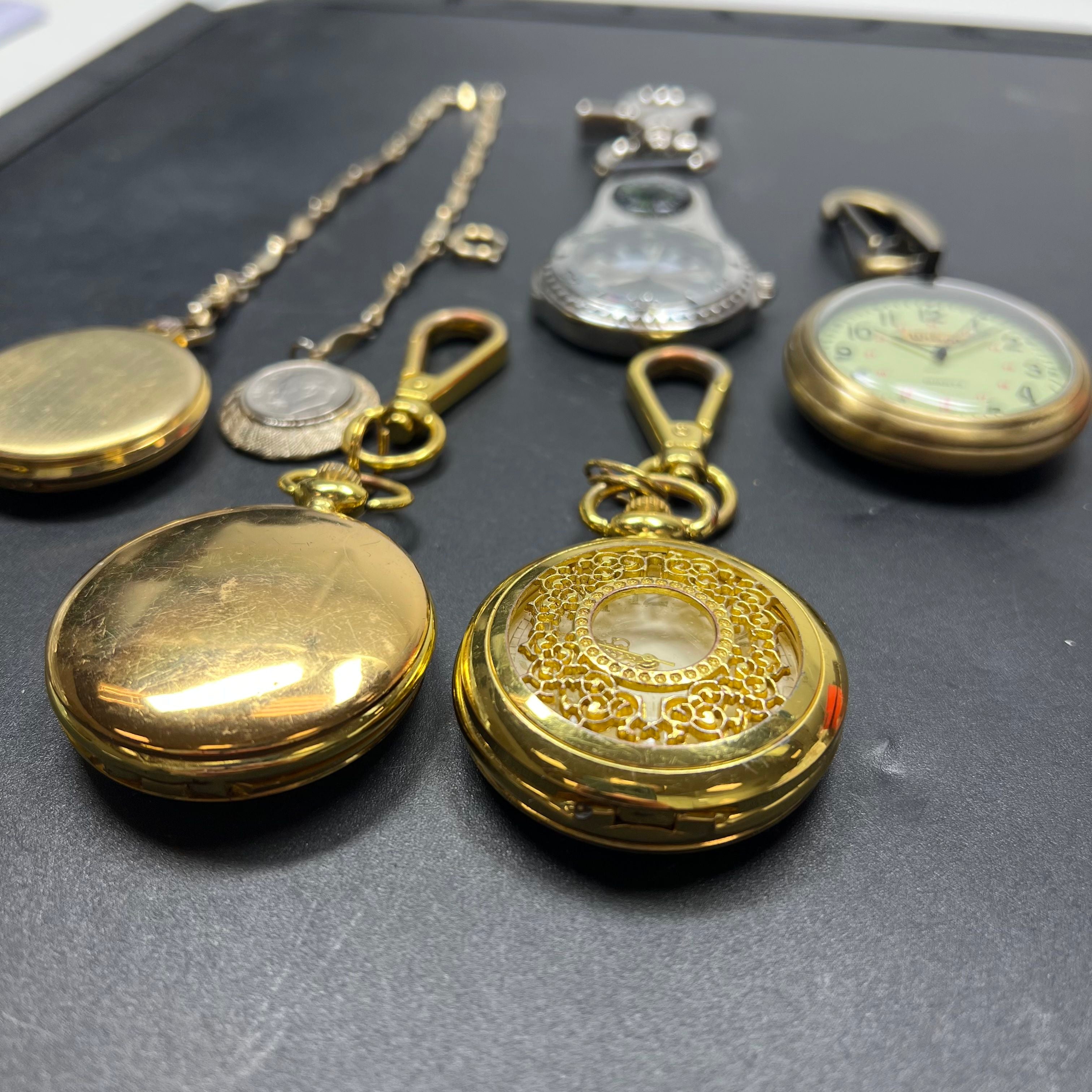 Lot of 5 Pocket Watches Clips Gold Tone Styles Vary UNTESTED