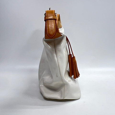 Dooney & Bourke White Patent Leather Tassel Hobo Bag Tan Trim